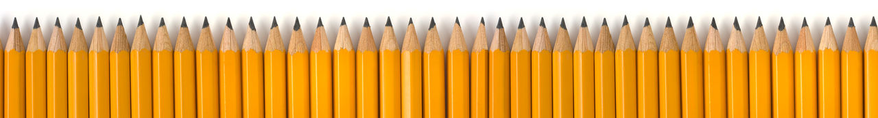 Subject: A row of yellow pencils against a white background, designed to be used as border for page layout, with space for text above.