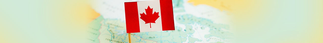Canadian flag over a map